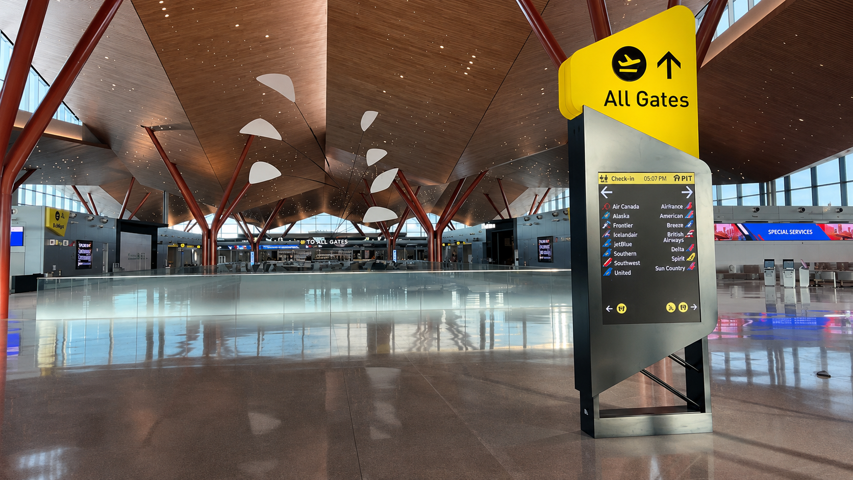 Digital All Gates wayfinding sign inside Pittsburgh International Airport