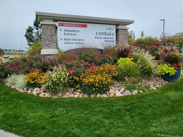 Centura Health hospital campus identification signage seen during the day