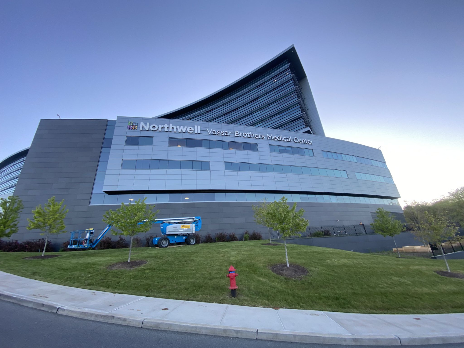 Northwell Vassar Brothers Medical Center exterior with large illuminated channel letters on a modern hospital facade